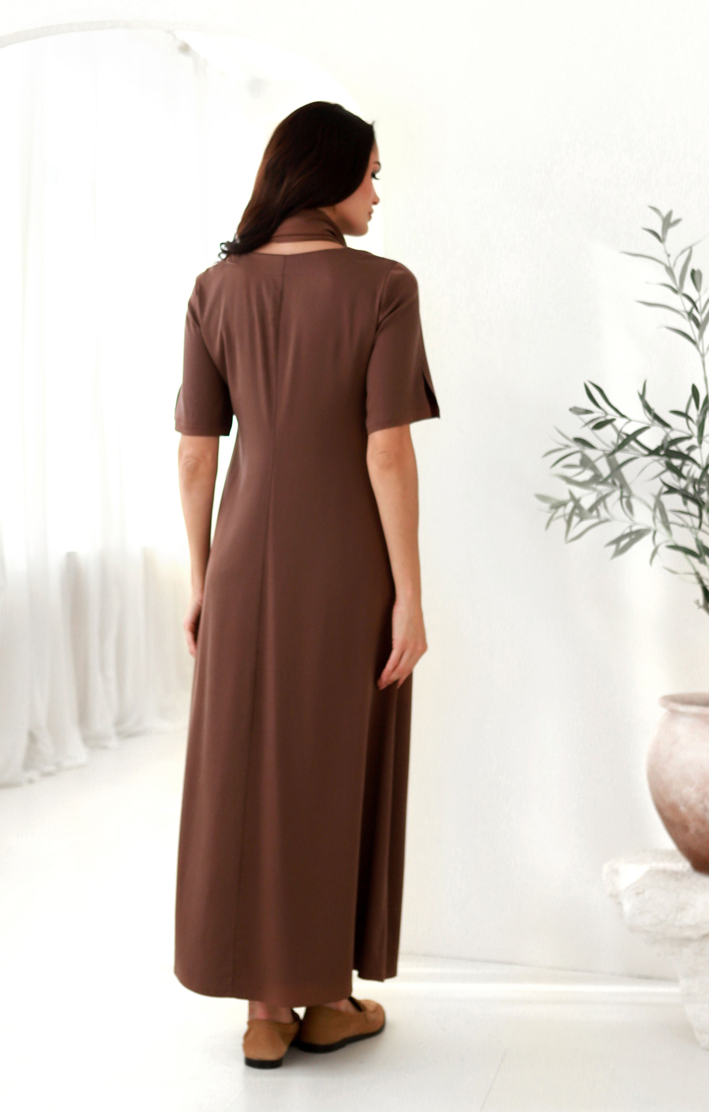 laisvai krintanti suknelė